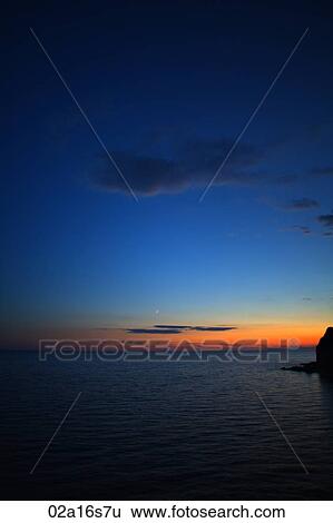 Sunset at sea View Large Photo Image Stock Photograph - Sunset at sea. Fotosearch