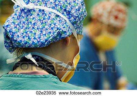 Stock Photography - Surgical healthcare team preparing for an operation.. Fotosearch