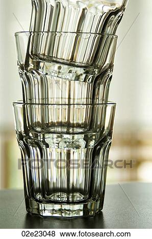 Three clear glasses stacked together. View Large Photo Image Stock Photo - Three clear glasses stacked together.. Fotosearch