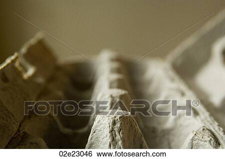 Stock Photograph - Tight detail of egg carton.. Fotosearch