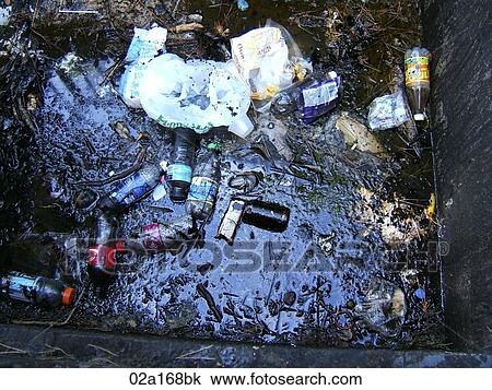 Trash in a pit View Large Photo Image Stock Image - Trash in a pit. Fotosearch