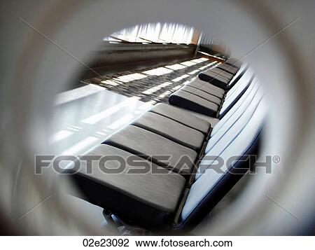 Tunneled view of airport sitting departures lounge. View Large Photo Image Stock Image - Tunneled view of airport sitting departures lounge.. Fotosearch