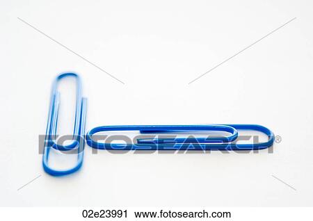 Two blue paper clips perpendicular to each other. View Large Photo Image Stock Image - Two blue paper clips perpendicular to each other.. Fotosearch