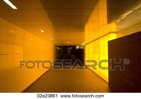 Underground hallway with yellow light. View Large Photo Image Stock Image - Underground hallway with yellow light.. Fotosearch