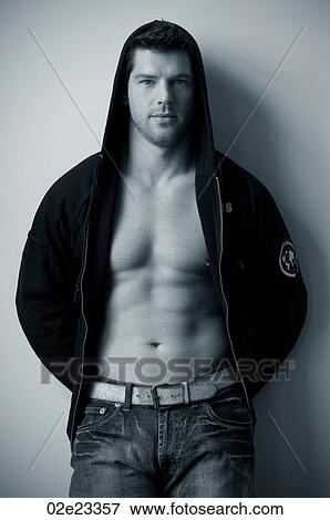 Very fit male with open hooded jacket. View Large Photo Image Stock Photo - Very fit male with open hooded jacket.. Fotosearch