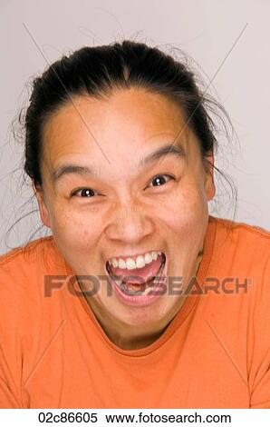 Vibrant Asian woman yelling. View Large Photo Image Stock Photography - Vibrant Asian woman yelling.. Fotosearch
