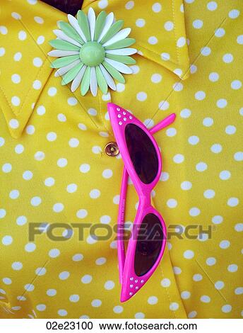 Stock Image - Vintage blouse and glasses.. Fotosearch