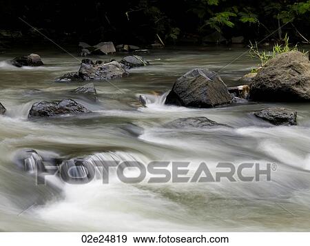 Water and rocks in Bali View Large Photo Image Stock Photo - Water and rocks in Bali. Fotosearch