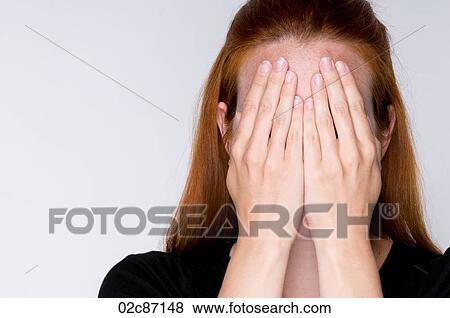 Woman covering face with hands. View Large Photo Image Stock Photo - Woman covering face with hands.. Fotosearch