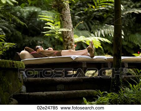 Woman relaxing in Bali View Large Photo Image Stock Photography - Woman relaxing in Bali. Fotosearch
