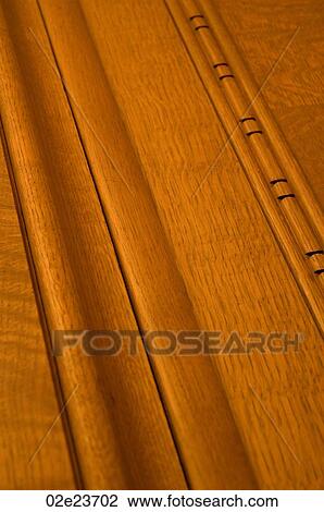 Stock Image - Wood moulding from corporate boardroom.. Fotosearch