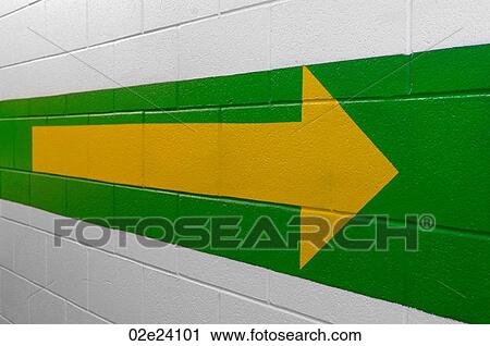 Yellow direction arrow pointing right on cement wall. View Large Photo Image Stock Image - Yellow direction arrow pointing right on cement wall.. Fotosearch