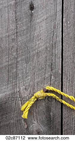 Yellow rope on old weathered wood planks. View Large Photo Image Stock Image - Yellow rope on old weathered wood planks.. Fotosearch