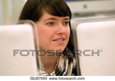 Young female student working on computer. View Large Photo Image Stock Image - Young female student working on computer.. Fotosearch