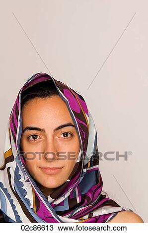 Young middle-eastern woman with head scarf. View Large Photo Image Stock Image - Young middle-eastern woman with head scarf.. Fotosearch