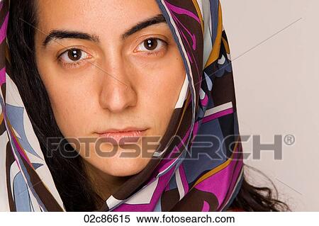 Young middle-eastern woman with head scarf. View Large Photo Image Stock Photography - Young middle-eastern woman with head scarf.. Fotosearch