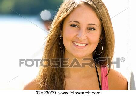 Young teen aged girl smiling. View Large Photo Image Stock Photo - Young teen aged girl smiling.. Fotosearch