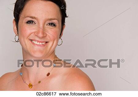 Young vibrant woman with gemstone necklace. View Large Photo Image Stock Photo - Young vibrant woman with gemstone necklace.. Fotosearch