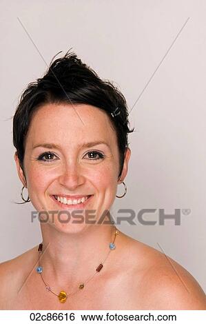 Young vibrant woman with gemstone necklace. View Large Photo Image Stock Photograph - Young vibrant woman with gemstone necklace.. Fotosearch