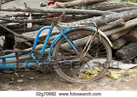 Abandoned bicycle leaning against a heap of logs, Sacred Valley, Cusco Region, Peru View Large Photo Image Stock Image - Abandoned bicycle leaning against a heap of logs, Sacred Valley, Cusco Region, Peru. Fotosearch