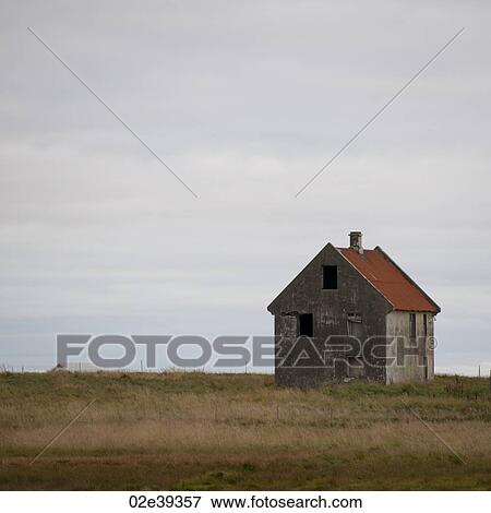 Abandoned house on meadow View Large Photo Image Stock Photo - Abandoned house on meadow. Fotosearch