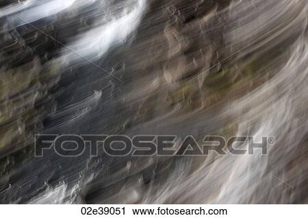 Abstract flowing rocks and boulders with white cloud wisps View Large Photo Image Stock Image - Abstract flowing rocks and boulders with white cloud wisps. Fotosearch
