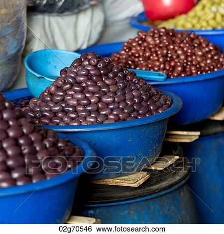 Stock Photograph - Acai berries for sale at a market stall, Mercado Central, Cuzco, Peru. Fotosearch