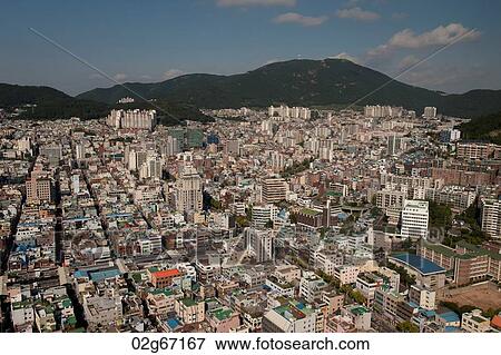 Aerial view of buildings in Busan city, Yeongnam, South Korea View Large Photo Image Stock Photo - Aerial view of buildings in Busan city, Yeongnam, South Korea. Fotosearch