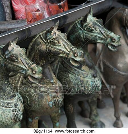 Artifacts for display at a market stall, Shanghai, China View Large Photo Image Picture - Artifacts for display at a market stall, Shanghai, China. Fotosearch