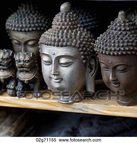Artifacts for display at a market stall, Shanghai, China View Large Photo Image Stock Photography - Artifacts for display at a market stall, Shanghai, China. Fotosearch