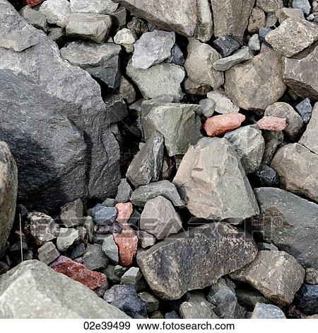 Assorted multicoloured jagged pebbles View Large Photo Image Stock Photo - Assorted multicoloured jagged pebbles. Fotosearch