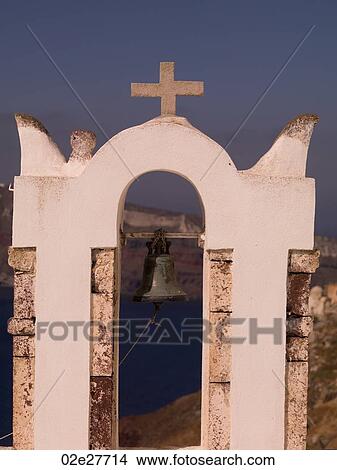 Bell and Crucifix on church in Santorini Greece View Large Photo Image Picture - Bell and Crucifix on church in Santorini Greece. Fotosearch