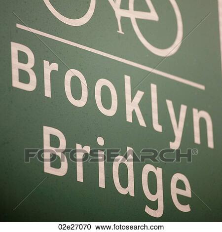 Bicycle lane direction sign to the Brooklyn Bridge in Manhattan, New York City, U. S. A. View Large Photo Image Stock Image - Bicycle lane direction sign to the Brooklyn Bridge in Manhattan, New York City, U. S. A.. Fotosearch
