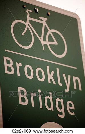 Bicycle lane direction sign to the Brooklyn Bridge in Manhattan, New York City, U. S. A. View Large Photo Image Stock Photo - Bicycle lane direction sign to the Brooklyn Bridge in Manhattan, New York City, U. S. A.. Fotosearch