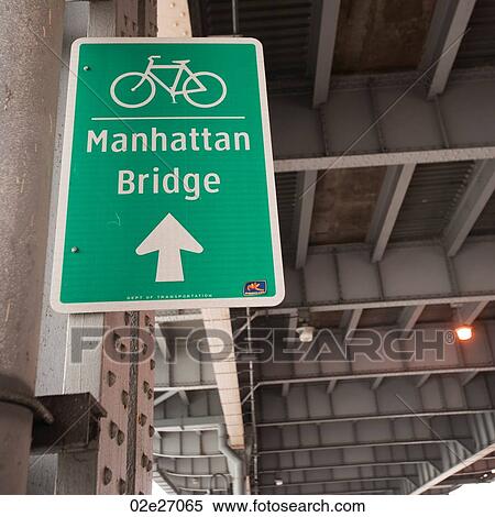 Bicycle lane direction sign to the Manhattan Bridge in Manhattan, New York City, U. S. A. View Large Photo Image Stock Photography - Bicycle lane direction sign to the Manhattan Bridge in Manhattan, New York City, U. S. A.. Fotosearch