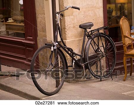 Bicycle on corner in Paris France View Large Photo Image Stock Image - Bicycle on corner in Paris France. Fotosearch
