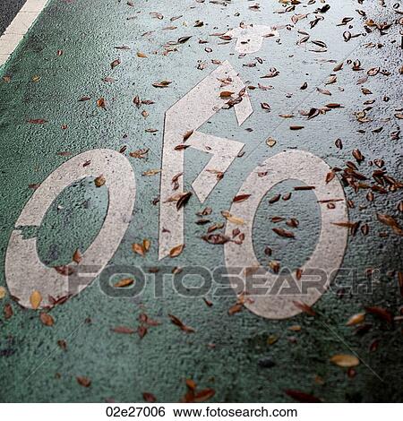 Biking lane symbol in Manhattan, New York City, U. S. A. View Large Photo Image Stock Photograph - Biking lane symbol in Manhattan, New York City, U. S. A.. Fotosearch
