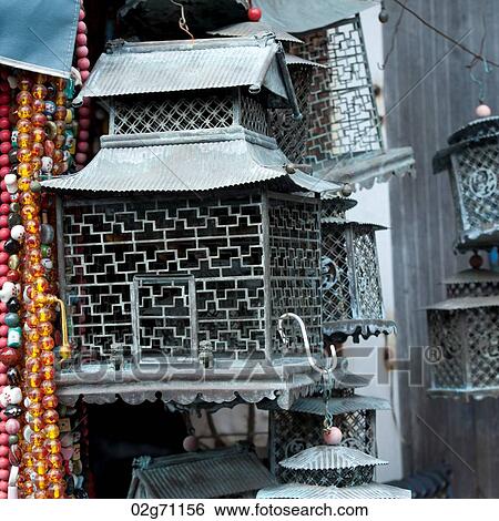 Birdcages at a street market, Shanghai, China View Large Photo Image Stock Photograph - Birdcages at a street market, Shanghai, China. Fotosearch