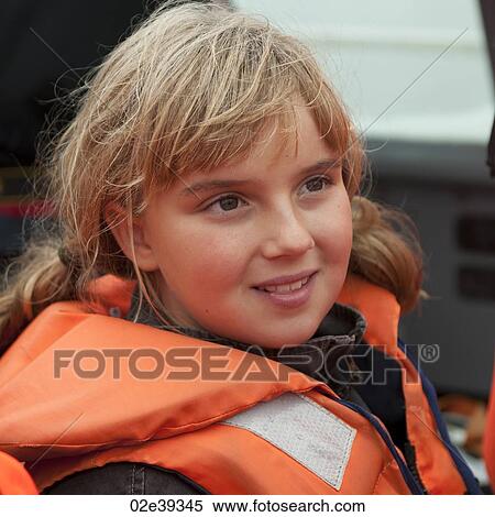 Blonde girl in live preserver, closeup View Large Photo Image Stock Photography - Blonde girl in live preserver, closeup. Fotosearch