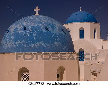 Stock Image - Blue dome on church in Santorini Greece. Fotosearch