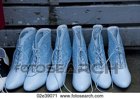 Blue laced boots in a row View Large Photo Image Stock Image - Blue laced boots in a row. Fotosearch