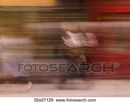 Blurred image of a person walking in Paris France View Large Photo Image Stock Photo - Blurred image of a person walking in Paris France. Fotosearch
