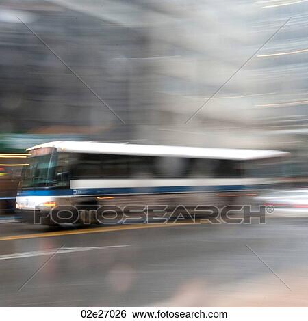 Blurred image of a transit bus in Manhattan, New York City, U. S. A. View Large Photo Image Stock Photograph - Blurred image of a transit bus in Manhattan, New York City, U. S. A.. Fotosearch
