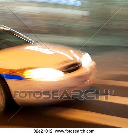 Blurred image of the front of a car on the streets of Manhattan, New York City, U. S. A. View Large Photo Image Stock Image - Blurred image of the front of a car on the streets of Manhattan, New York City, U. S. A.. Fotosearch