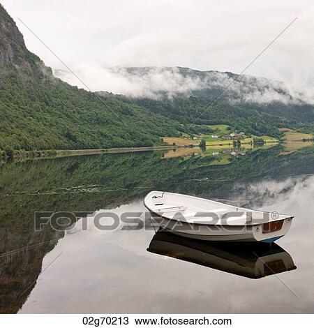 Boat in a lake, Granvinsvatnet, Granvin, Hordaland County, Norway View Large Photo Image Stock Image - Boat in a lake, Granvinsvatnet, Granvin, Hordaland County, Norway. Fotosearch
