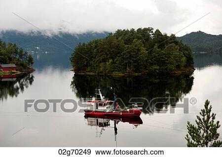 Boat in the fjord, Bjorn Fjord, Hardangervidda, Hardanger, Norway View Large Photo Image Stock Photo - Boat in the fjord, Bjorn Fjord, Hardangervidda, Hardanger, Norway. Fotosearch
