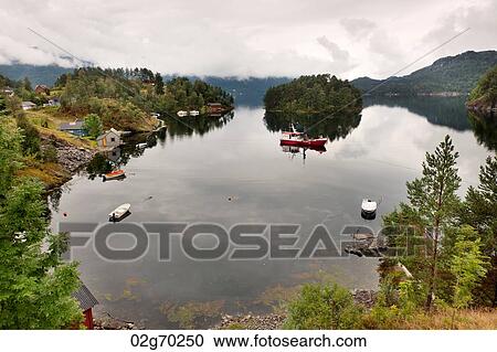 Boats in the fjord, Bjorn Fjord, Hardangervidda, Hardanger, Norway View Large Photo Image Stock Image - Boats in the fjord, Bjorn Fjord, Hardangervidda, Hardanger, Norway. Fotosearch