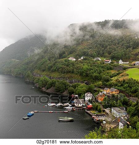 Boats moored at a port, Trengereid, Sorfjord, Norway View Large Photo Image Stock Image - Boats moored at a port, Trengereid, Sorfjord, Norway. Fotosearch
