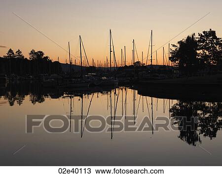 Boats with reflections at the marina in Vancouver, British Columbia, Canada View Large Photo Image Stock Image - Boats with reflections at the marina in Vancouver, British Columbia, Canada. Fotosearch