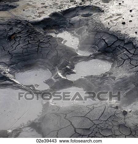 Boiling geothermal cracked mud puddles View Large Photo Image Stock Image - Boiling geothermal cracked mud puddles. Fotosearch